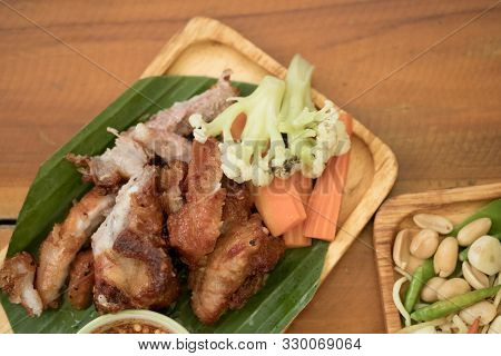 Fried Pork Rib, Deep Fried Fried Pork Rib Or Fried Pork Served On Banana Leaf