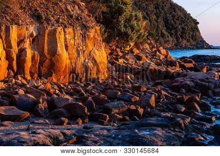 Scenic Rocky Beach Cala Violina Landscape At The Sunset. Tyrrhenian Sea Bay At The Sunset. Province 