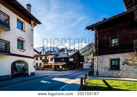 Livigno, Italy, April 2016 Traditional Alpine Wooden Architecture In The Village, Livigno Is A Ski C