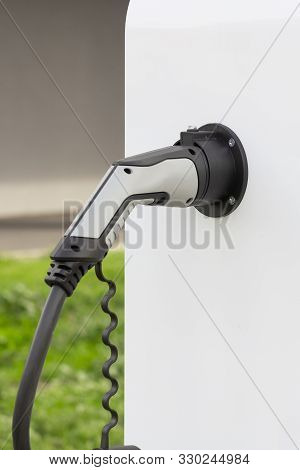 Modern Electrical Fast Charger To Electrical Or Hybrid Automobiles. High Technology Charger For Gree