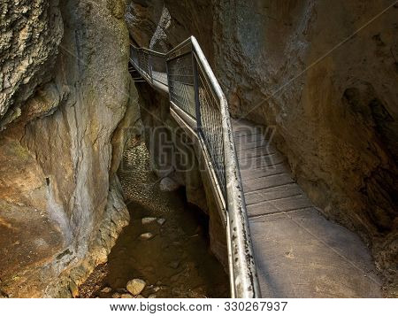 Passageway Between The Rocks And The River.