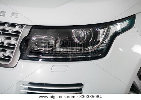Novosibirsk, Russia - September 09, 2019:  Range Rover Vogue Se,  Car Headlights. Exterior Detail. C