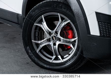 Novosibirsk, Russia - September 18, 2019:  Chevrolet Captiva,  Close-up Of The Bumper, Alloy Wheel, 