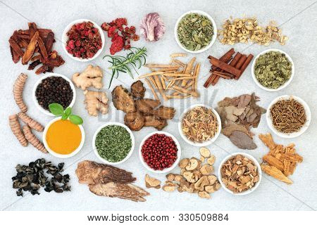 Super food collection for good health, vitality and fitness including herbs and spice used in natural and chinese herbal medicine. Flat lay.