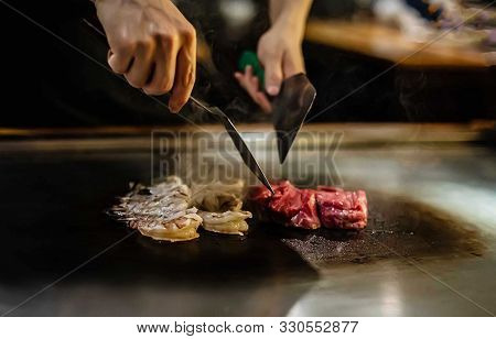 Teppan Show In A Japanese Restaurant, Cooking Directly In Front Of The Client, Fish, Rice, Meat, Veg