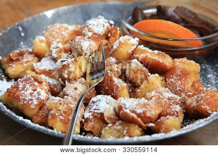 Sugared Pancake With Plums Called Kaiserschmarrn. Germany