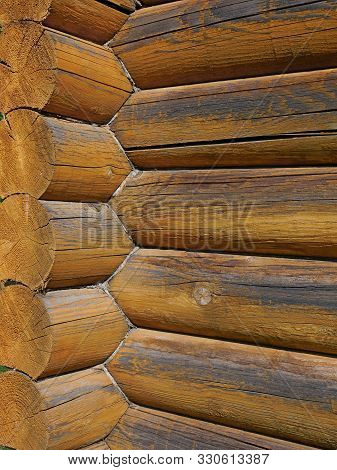 Coner With Big Wooden Logs Outdoors