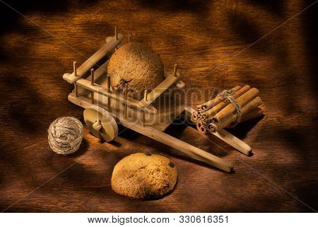 Beautifulo Omposition With Cookies And Cinnamon On A Wooden Foreground, Selective Focus