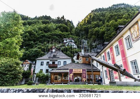 Hallstadt, Austria - July, 2019: Beautiful Houses Of Hallstadt, Austria. Tourist Destinations.