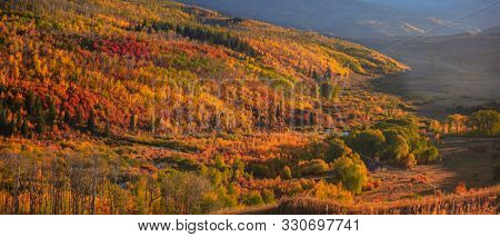 View of autumn valley from highway 133 in Colorado