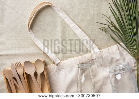 Cotton Fabric Tote Shopper Bag Wooden Cutlery Crystal Jar Bottle Green Palm Leaf On Linen Fabric Bac