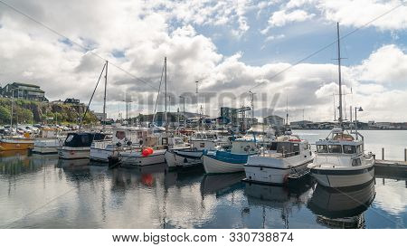 Torshavn, Faroe Islands - August 2019: Fishing Boats In Torshavn Harbour On Faroe Islands.