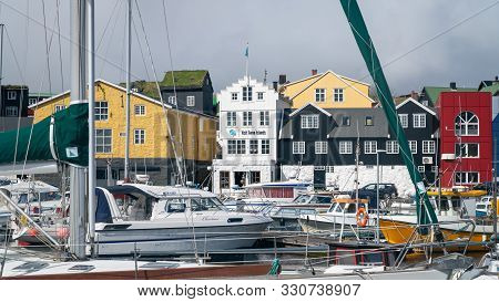 Torshavn, Faroe Islands - August 2019: Visit Faroe Islands Building In The Harbour Of Torshavn