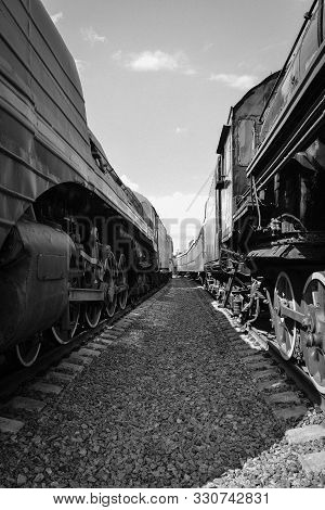 Between Cars Of Old Trains, Between Two Old Trains, Black And White Vintage Photo Of Trains