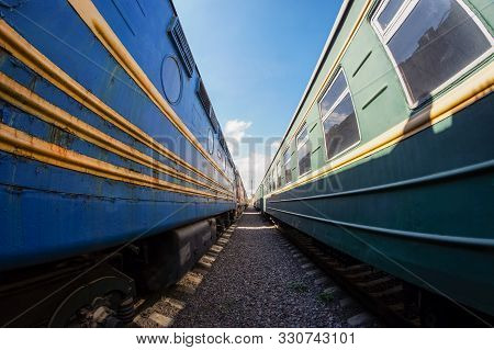 Between Cars Of Vintage Trains, Between Two Old Trains