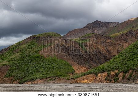 The White Dots In The Center Of The Photo Are Dall Sheep In Dwnali National Park In Alaska.