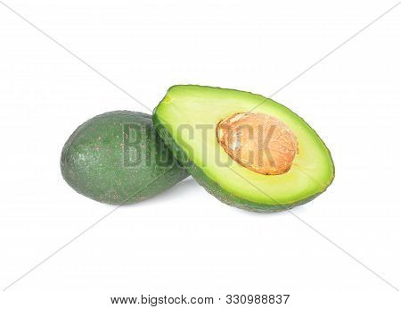 Whole And Half Cut Pinkerton Avocado On White Background