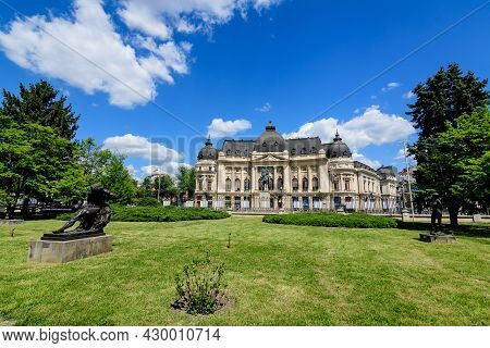 Bucharest, Romania, 6 May 2021: The Central University Library With Equestrian Monument To King Caro