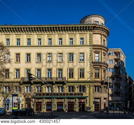 Budapest, Hungary, March 2020, building at Bajcsy-Zsilinszky utca 21 with one of five of “The Pointer Pub”