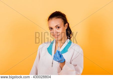 African-american Doctor Woman, Mask, Stethoskope, Robe Vaccine In Studio