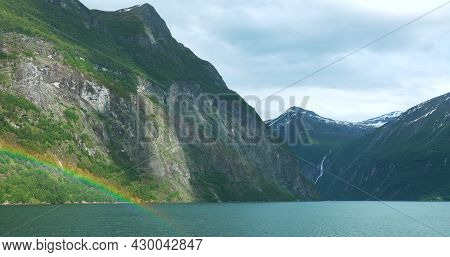 Sunnylvsfjorden, Norway. Colorful Rainbow Above Sunnylvsfjorden Spring Landscape. View From Floating