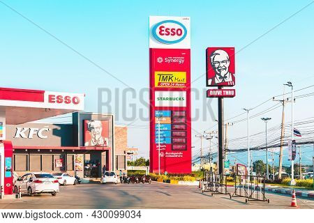 Kanchanaburi, Thailand-december 31,2020 : Kfc Drive Thru Logo Billboards On A Pole Along With Leadin