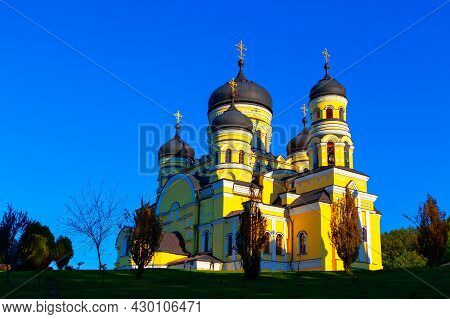 Orthodox Church Painted In Yellow . Monastery Hincu , Famous Place Of Worship In Moldova