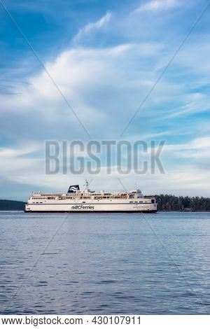 Victoria, Vancouver Island, British Columbia, Canada - August 9, 2021: Bc Ferries Boat Arriving To T
