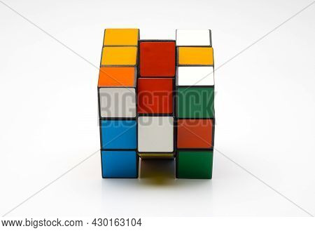 Dhaka, Bangladesh - 18 August 2021: Rubik Puzzle Unsolved Cube Close View On Isolated White Backgrou