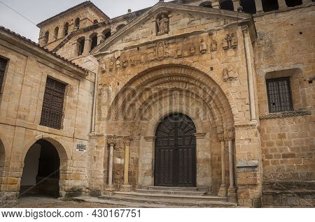 Main Facade View Of The Romanesque Collegiate Church Of Santillana Del Mar In Cantabria In Spain.