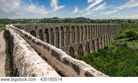 Tomar, Portugal - April 2018: Pegoes Aqueduct By The Castle And Convent Of The Order Of Christ