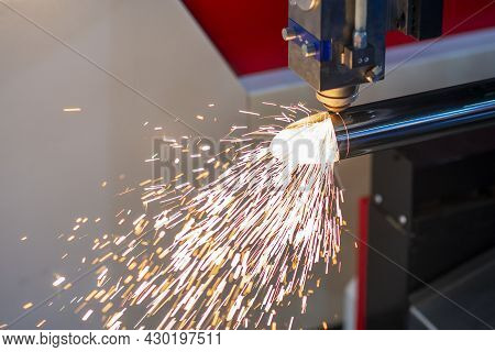 The Fiber Laser Cutting Machine Cutting The Stainless Steel Tube Control By Cnc Program. The Sheet M