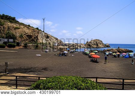 Portman, Cartagena Province, Murcia, Spain- July 19, 2021: Lastre Beach In Portman Village On A Sunn