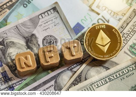 Non-fungible Token. Gold Letter Nft And Coin Ethereum. Blockchain Cryptocurrency Coin On Background 