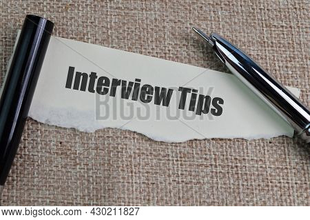 Pen And Ripped Paper Written With Text Interview Tips