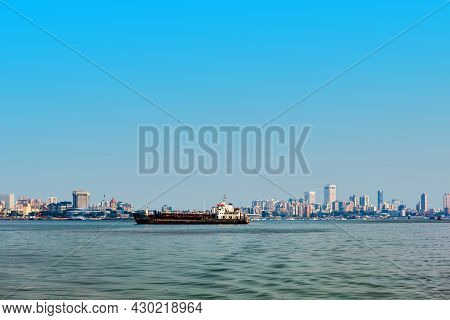 Big Ship And Mumbai City Skyline Panoramic View From Nariman Point At Marine Drive. Mumbai Is A Fina