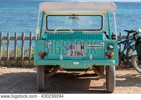 Formentera, Spain: 2021 August 17: Retro Citroen Mehari In Light Blue And White On Mijorn Beach In F