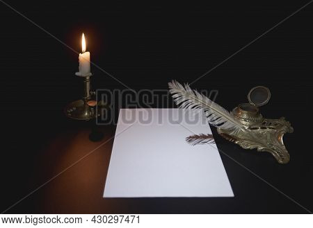 Decorative Inkwell And Candlestick. Styling Writing Instruments. Candle, Pen, Blank Sheet Of Paper. 