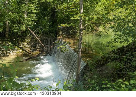 Waterfall At A Barrage In The Forest In The Bavarian Forest Chiemgau Germany