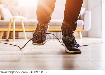 Wire Cord Trip Over And Fall. Feet Stumble On Cable