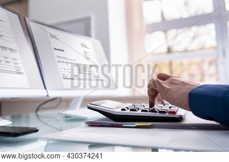 Electronic Invoice Accountant Software On Computer. Vat Tax Calculation