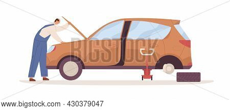 Car Mechanic Repairing Auto With Open Hood Raised Up. Maintenance And Inspection Of Automobile Engin