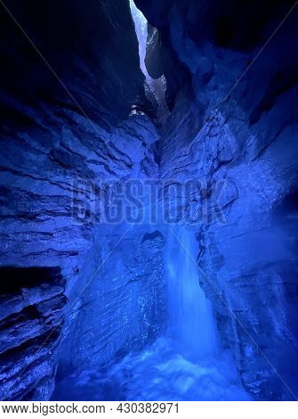 Waterfall In Cave With Colored Lights Cascate Del Varone