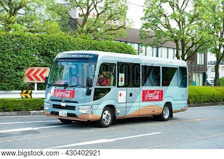 Fuji City, Shizuoka-ken, Japan - June 24, 2021: Tokyo 2020 Olympic Torch Relay. Car Parade With Part