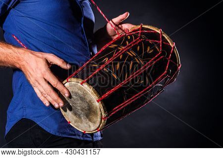 Closeup Drummer Male Hands With Jembe. Man Is Drumming On Wooden Ethnic Drum. Percussion Musical Ins