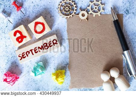 September 20Th. Day 20 Of Month. Wood Cube Calendar With Date Month And Day.
