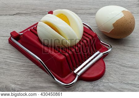 Household Device For Slicing Eggs. Hard-boiled Eggs Slicer Tool.