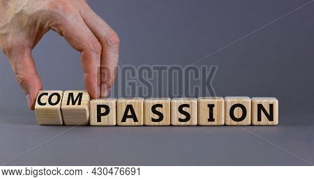 Passion Or Compassion Symbol. Businessman Turns Cubes, Changes The Word Compassion To Passion. Beaut