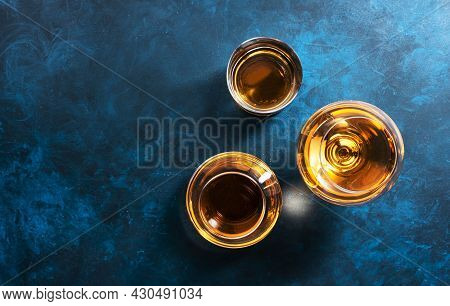 Strong Alcohol Drinks, Hard Liquors, Spirits And Distillates Iset In Glasses: Cognac, Scotch, Whiske