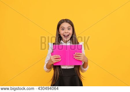 Surprised Teen Girl In School Uniform Reading Book, Amasement